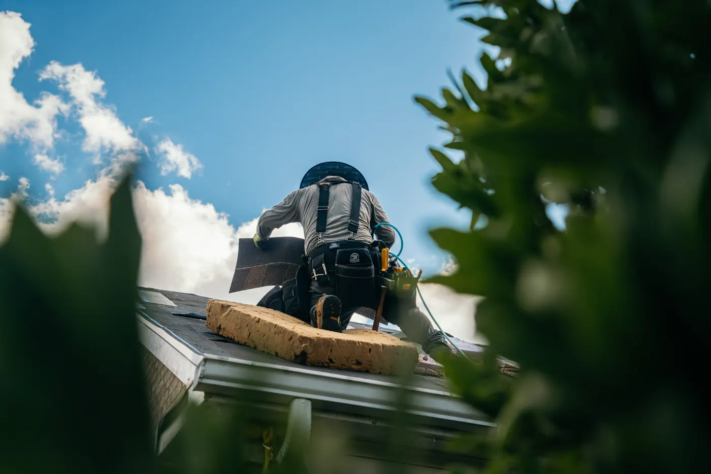Tarping and dry-in on a Wild Air commercial roof